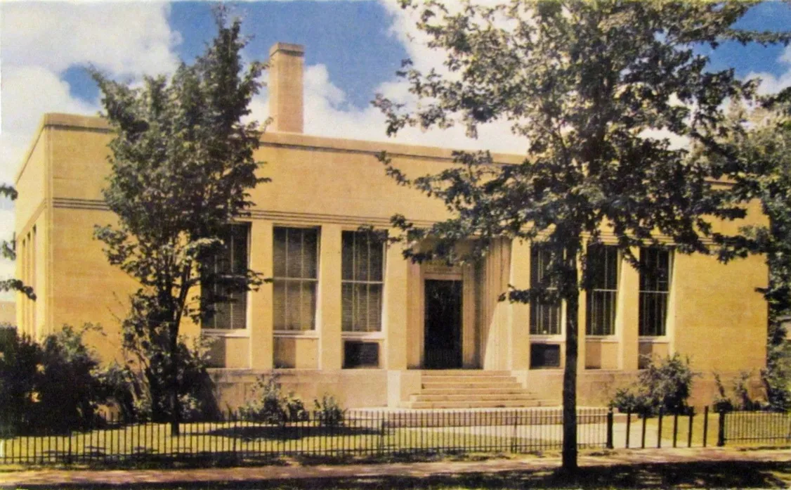 Vintage color postcard of the stone AFU building with tall windows, a central entry and an iron fence