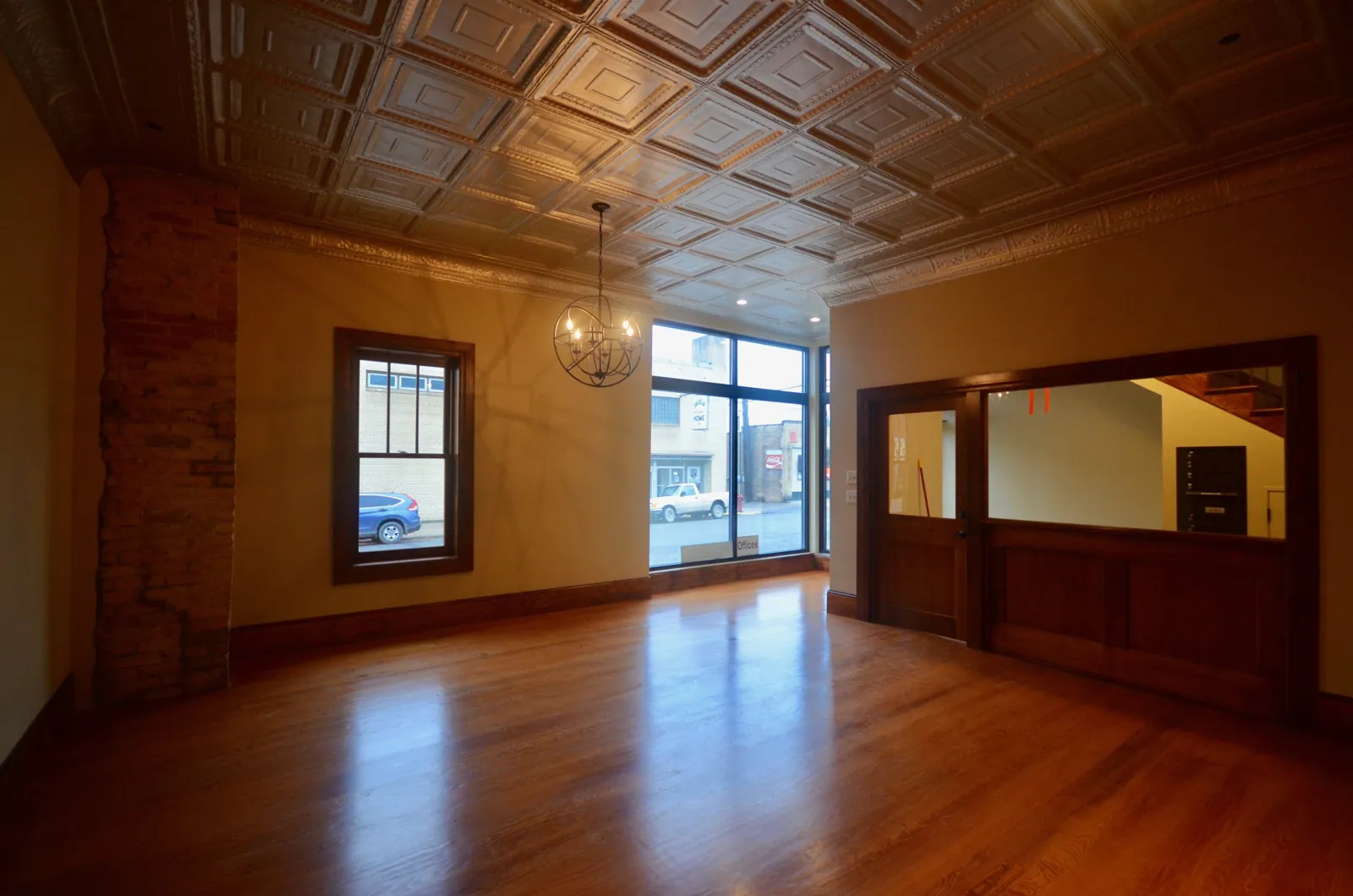 Restored interior with a pressed-tin ceiling and hardwood floors in downtown Ely
